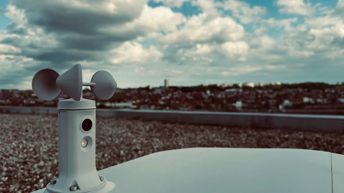 Wind sensor and camera of a dock installed on a rooftop